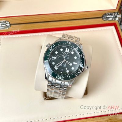 High Quality Replica OMEGA Seamaster 300 Different Straps (316 Stainless Steel/Silicone) Grey Wavy Ceramic Face Dial Green Ceramic Bezel Stainless Steel Case Watch 42mm